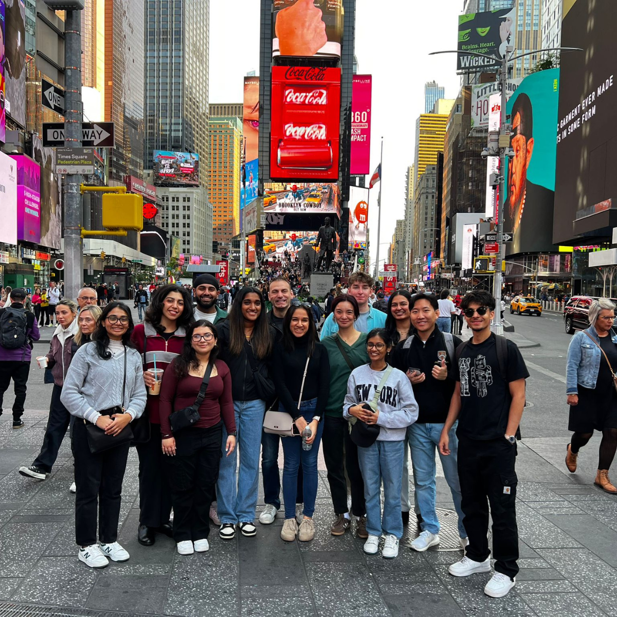 Students pose at Times Square