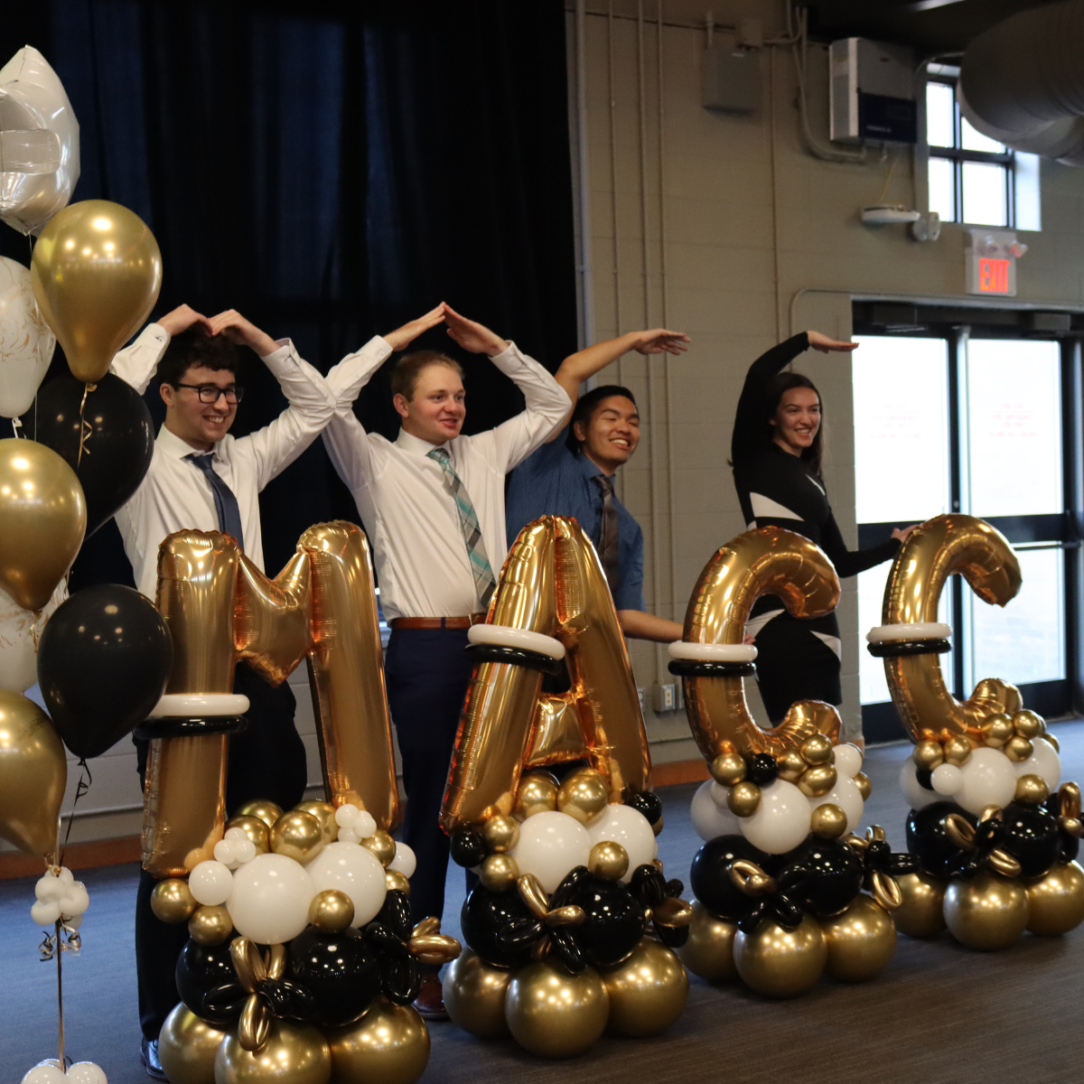 Students pose for MACC graduation