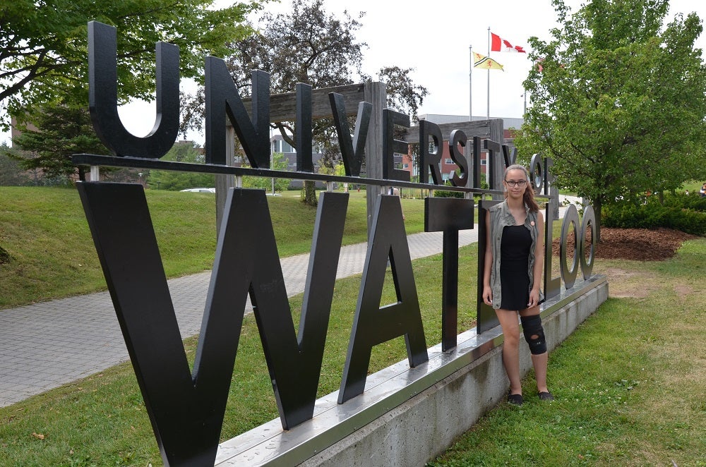 Kyrie with uwaterloo sign
