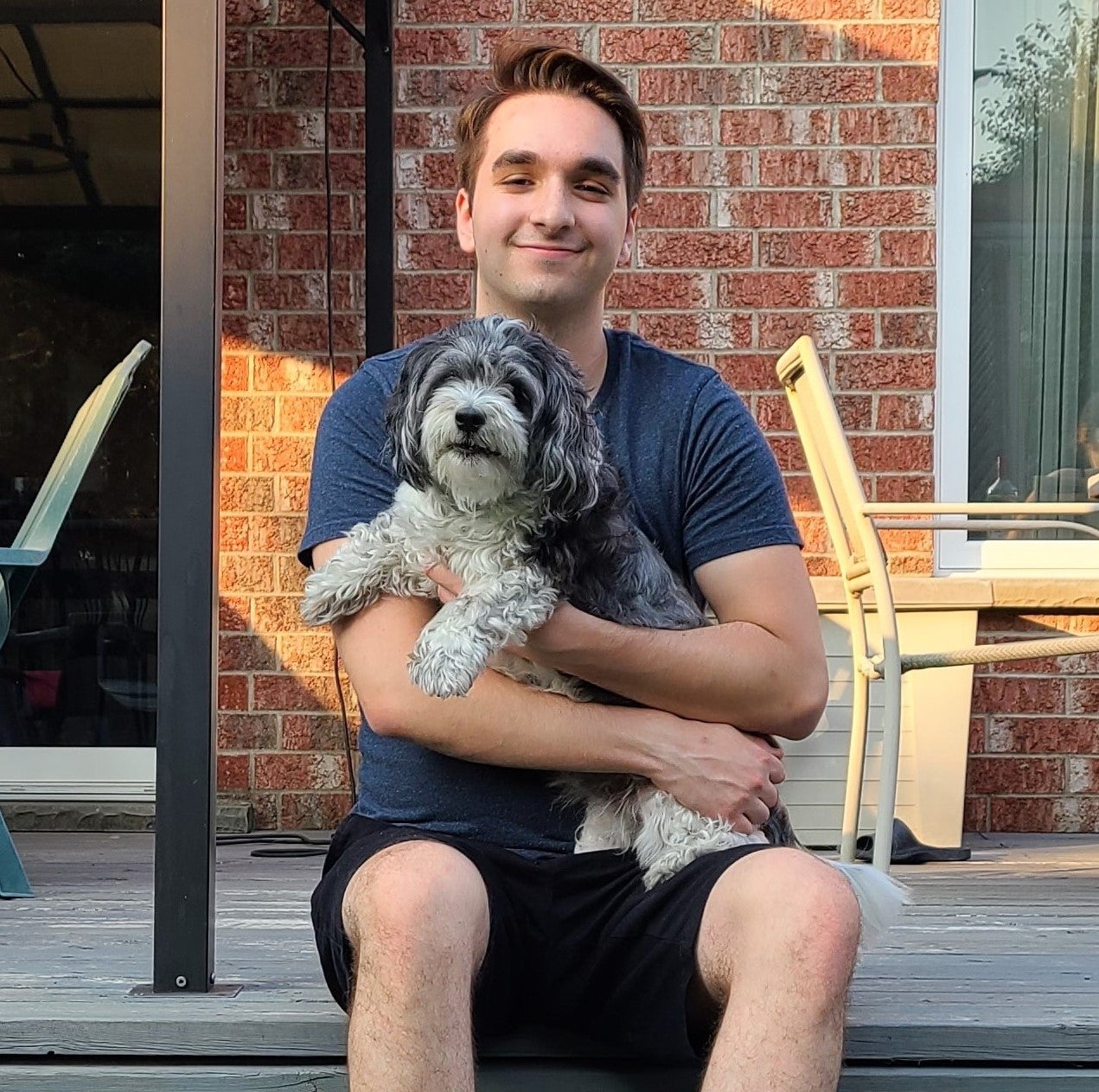 Matthew Hastie holding a dog