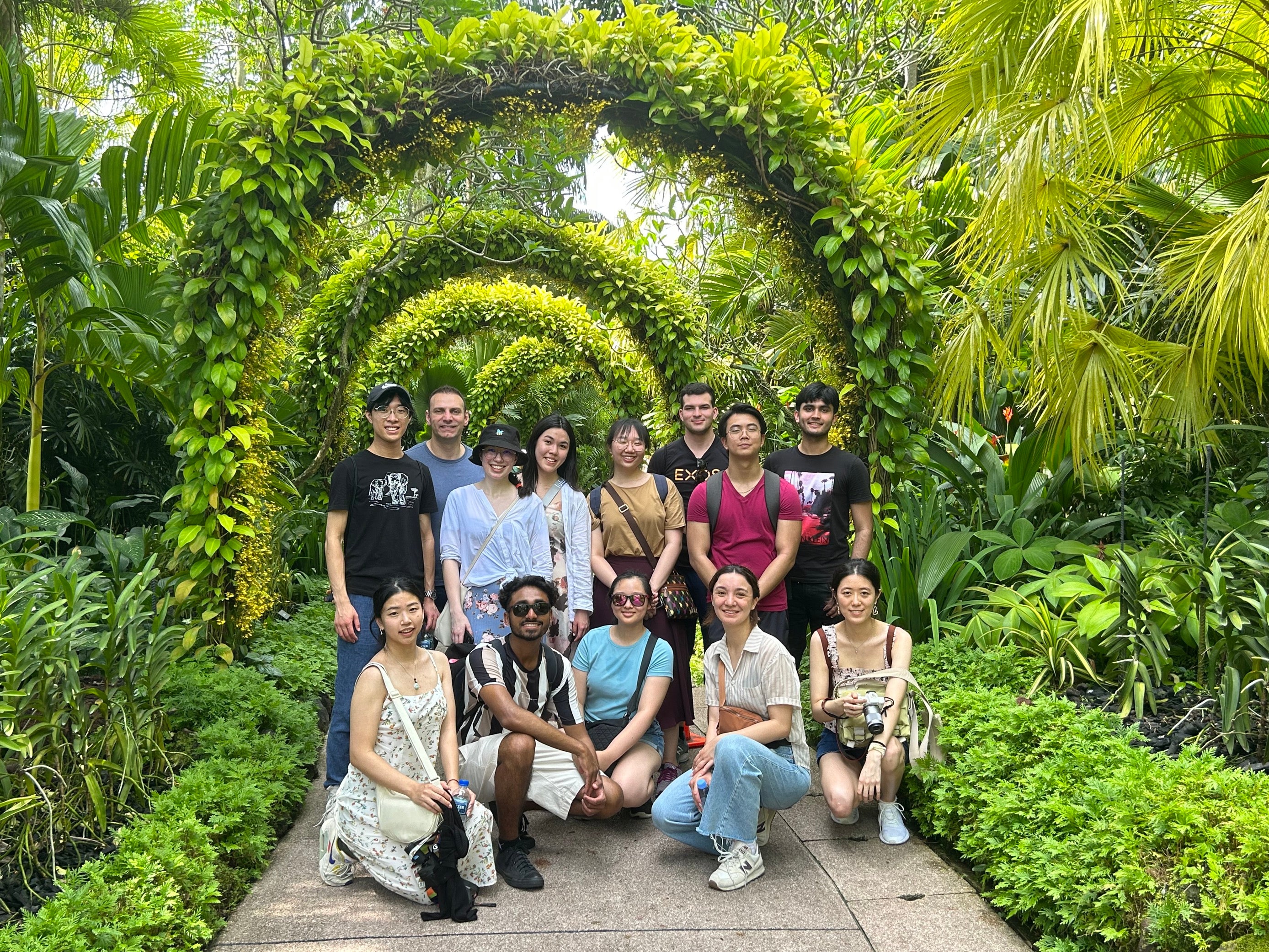 The Singapore team standing in the Singapore gardens
