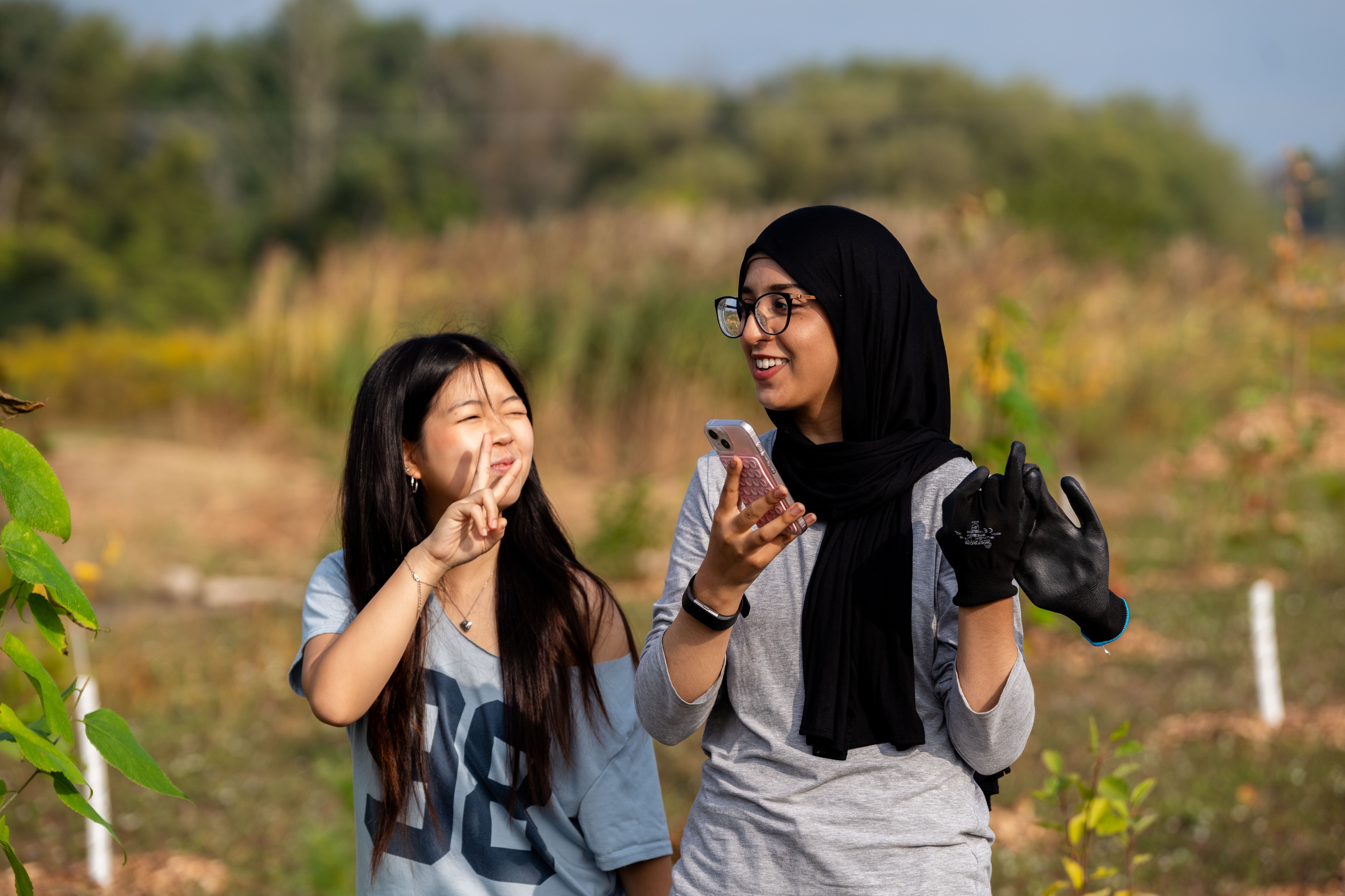 Two SFM students at the tree planting event