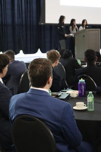 Student listening to speaker