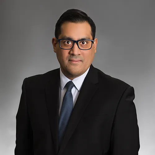 portrait of man in black suit