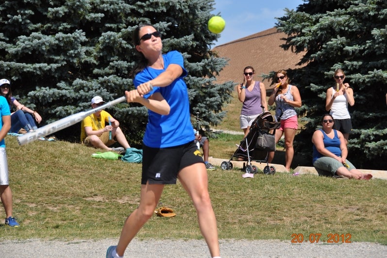 Action shot of a student swinging at the ball in the 2012 Game