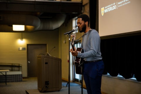 student performing on a stage