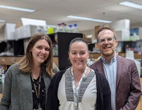 Dale Martin, Shaun Sanders and Melanie Alpaugh in a biology lab