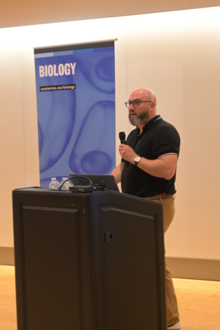 Travis Craddock presenting a public lecture