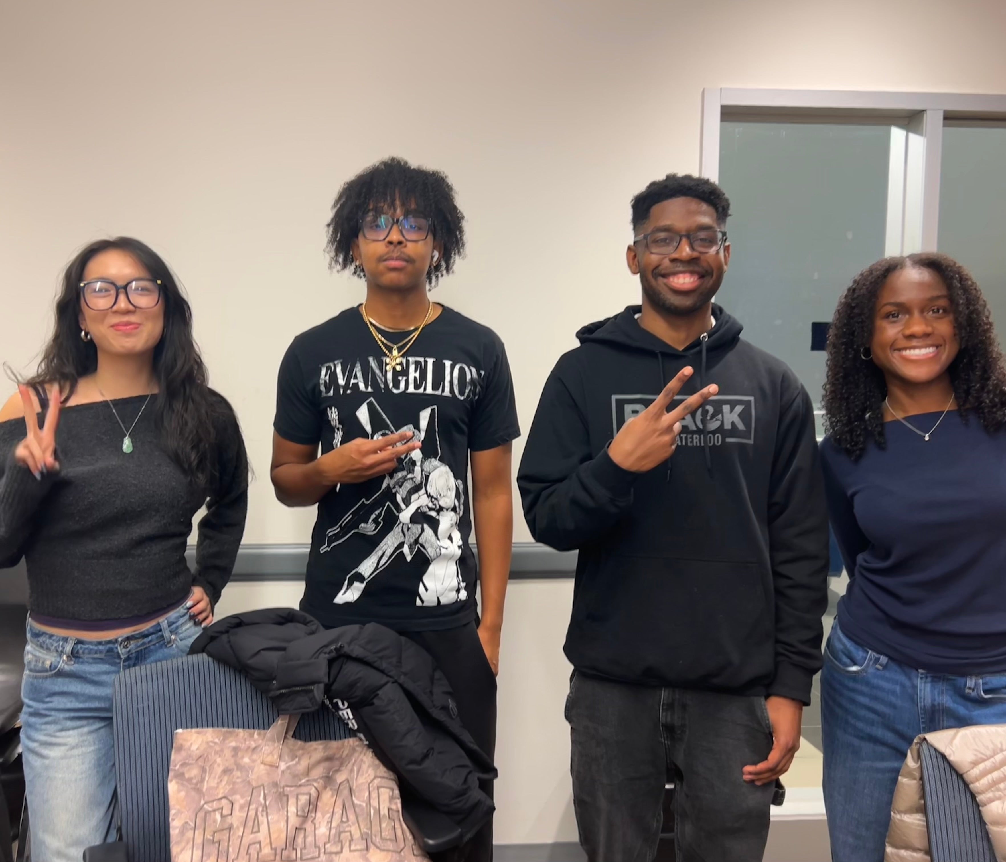 4 students posing together