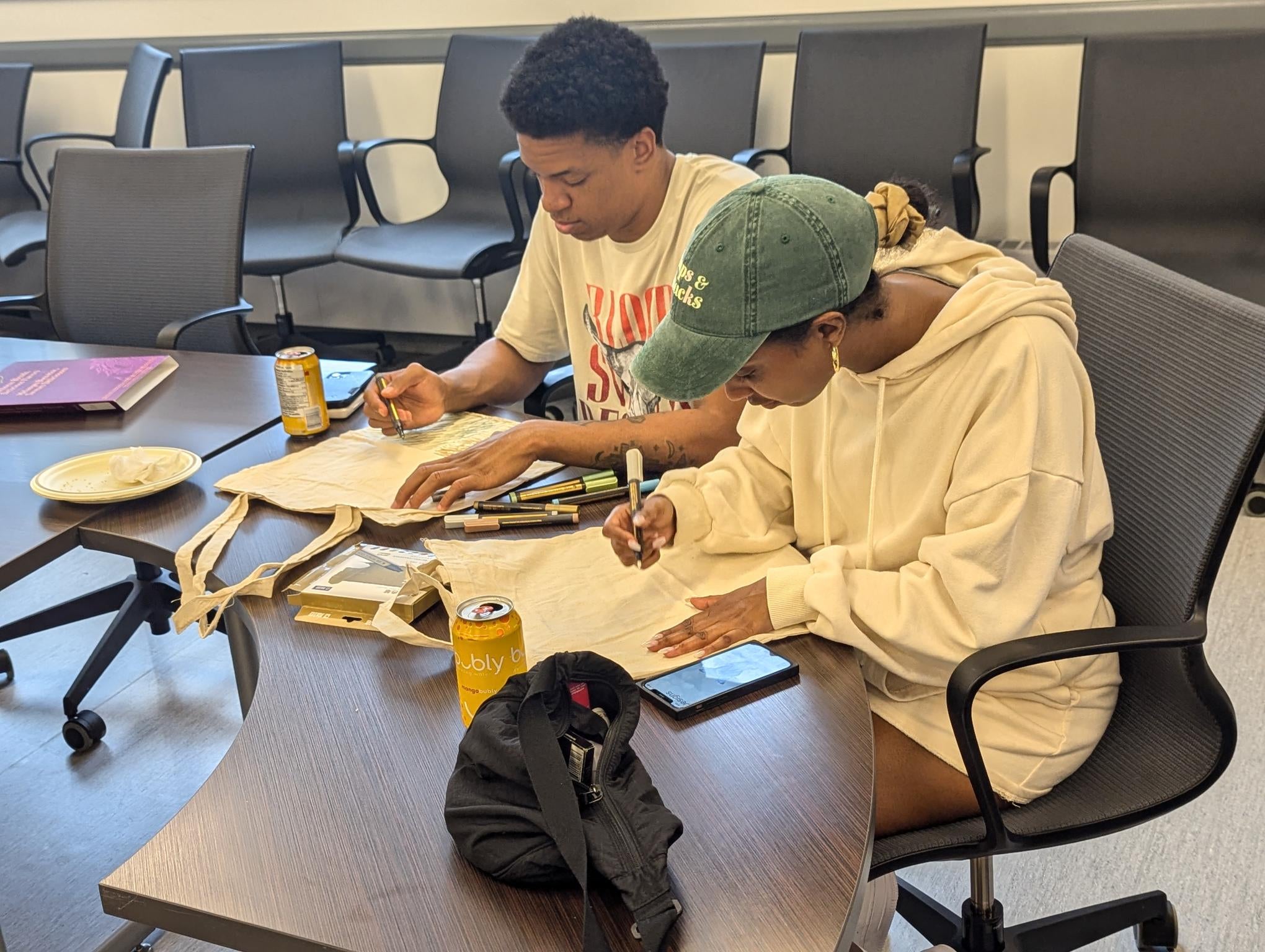 Two students at a self-care event