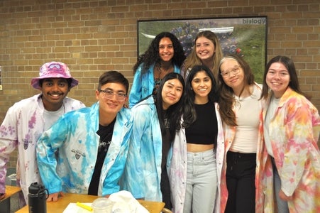 Science Orientation coordinators in tie-dyed lab coats