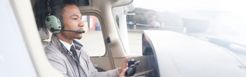 A science student flying a plane