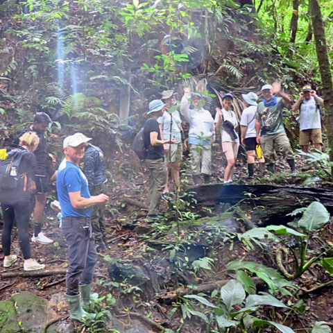 Chris Houser with alumni in a Costa Rican rainforest