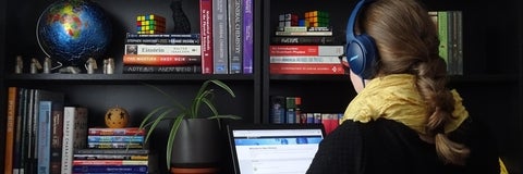 Student studying at her desk at home.
