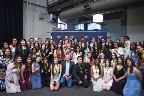 Group of award winners posing for a picture with the Dean of Science.