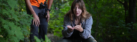 a science student watching a bird take flight
