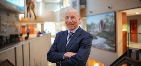 Mario Coniglio is standing in the Centre for Environmental Information and Technology.