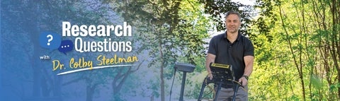 Dr. Colby Steelman with ground-penetrating radar equipment.  