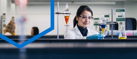 Undergraduate student working in a chemistry lab.