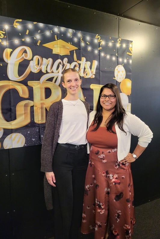 Two chemistry students celebrating graduation