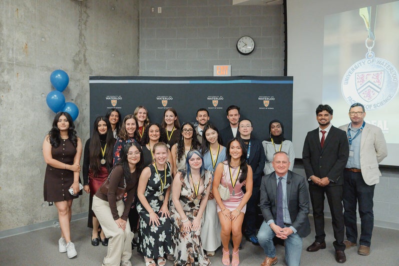 A group photo of the silver medal graduates