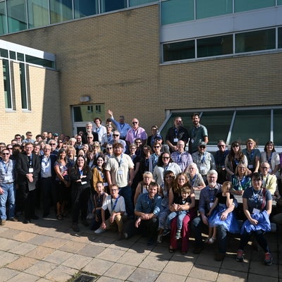 Group photo of over 100 people at the Earth Science Alumni Celebration