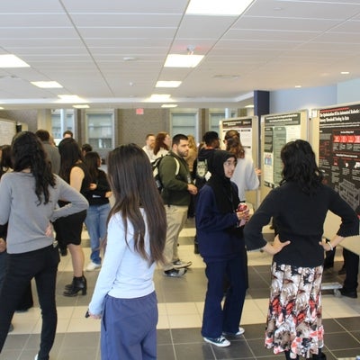 SoNR conference 2025 poster session jam packed with participants and attendees.