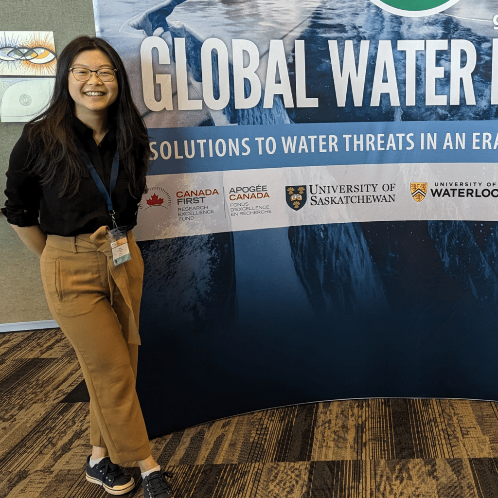 Jane Ye in front of Global Water banner