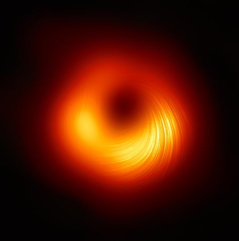 M87* image, showing lines of bright light spiralling around the black hole