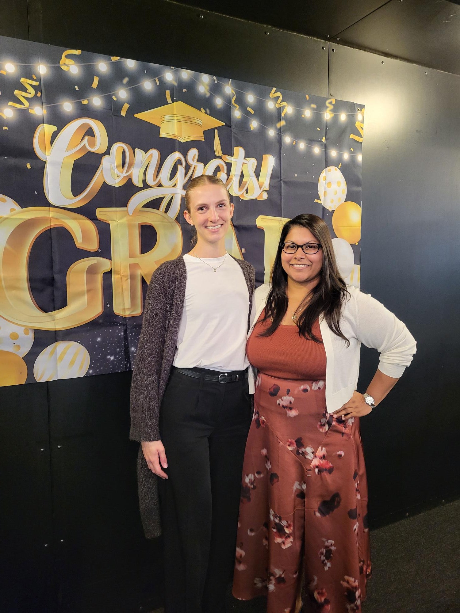 Two chemistry students celebrating graduation