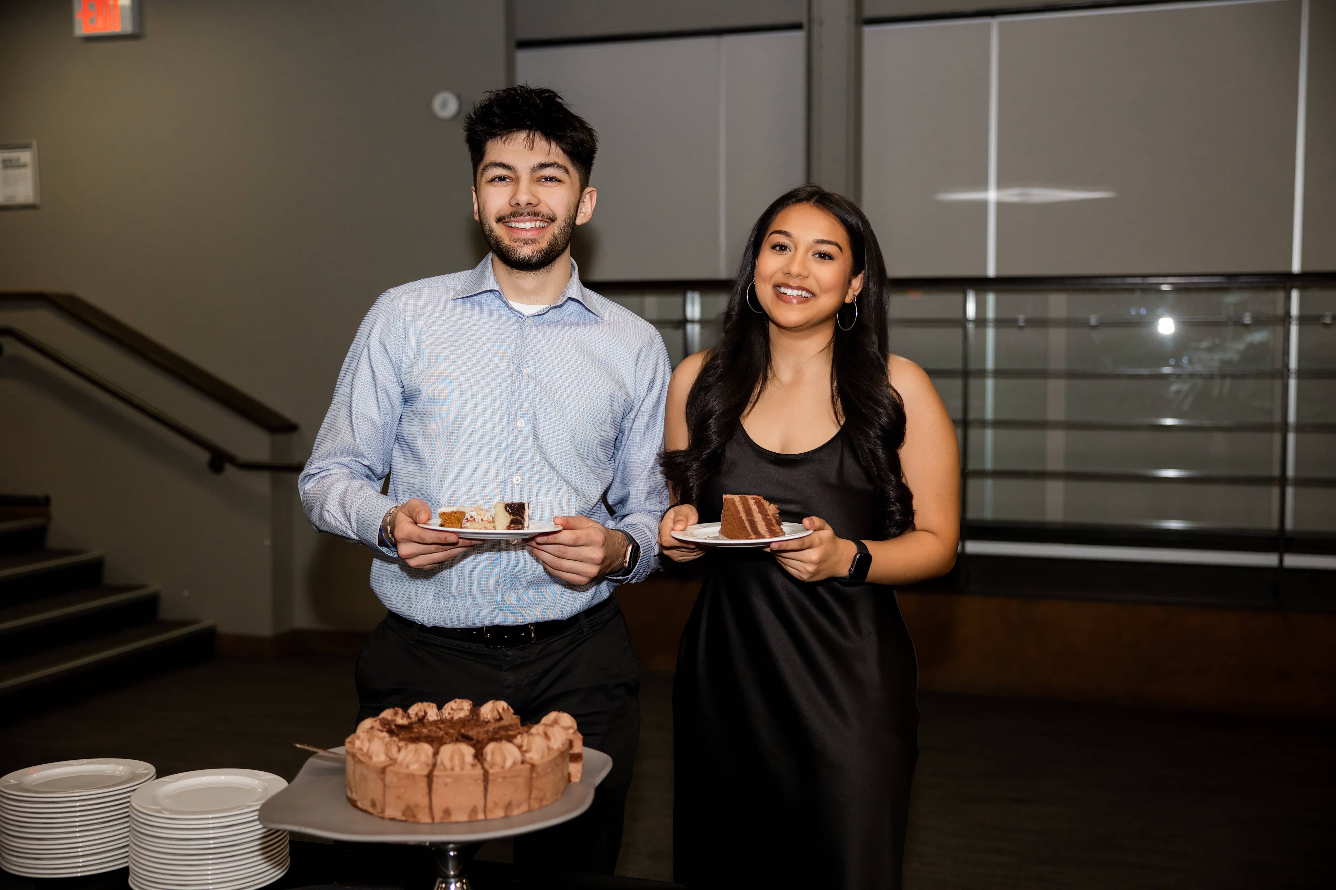 W24 SCBUS Showcase - two students celebrating