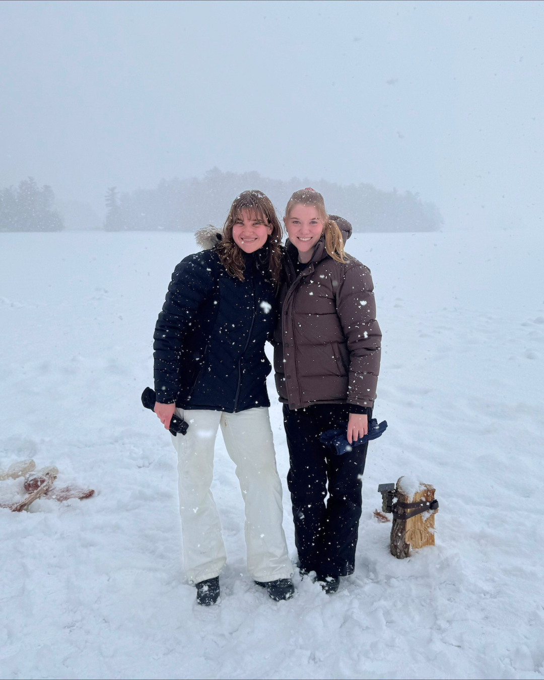 Bethany and a friend outside in the snow 