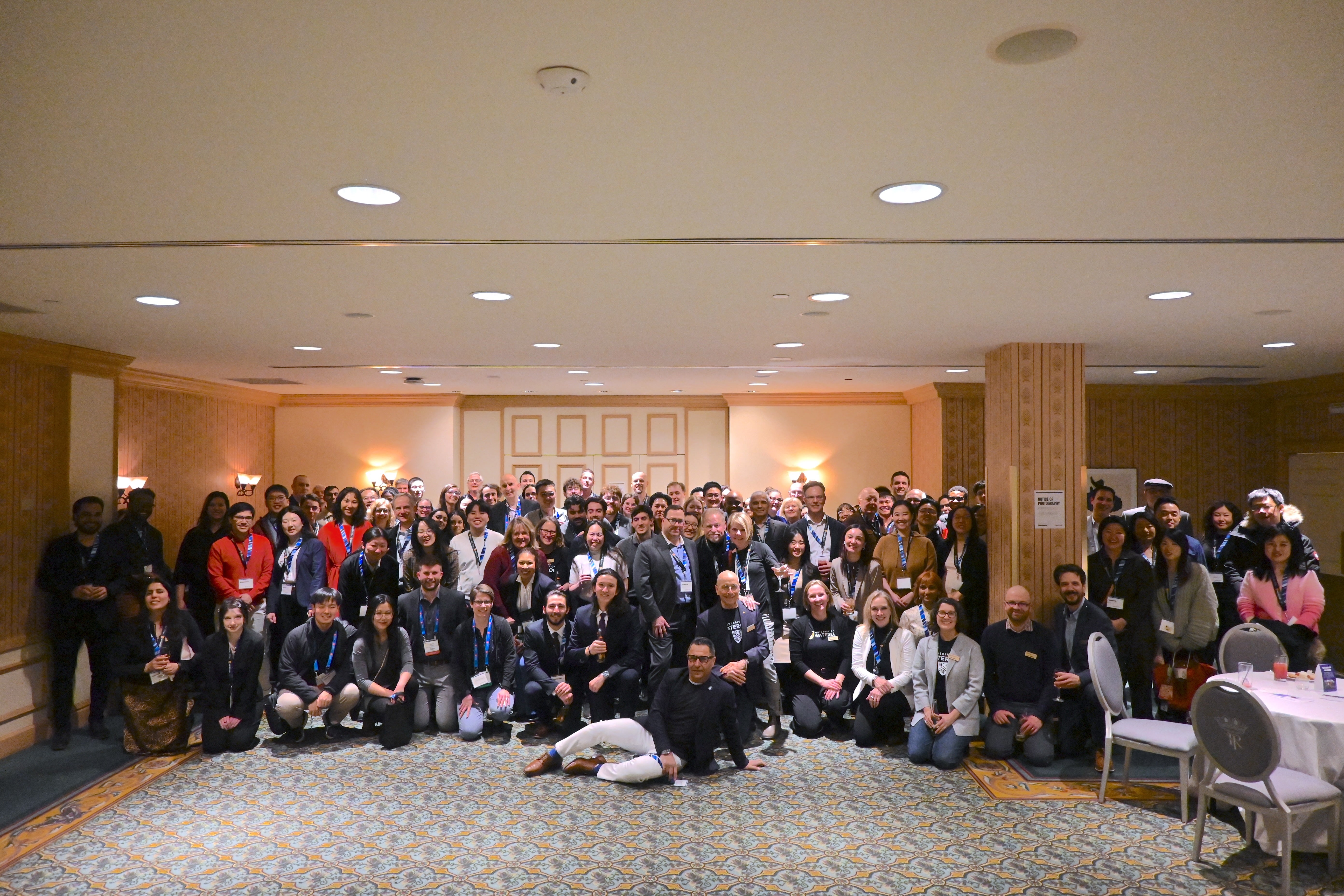 A group of around 100 people at the PDAC alumni event