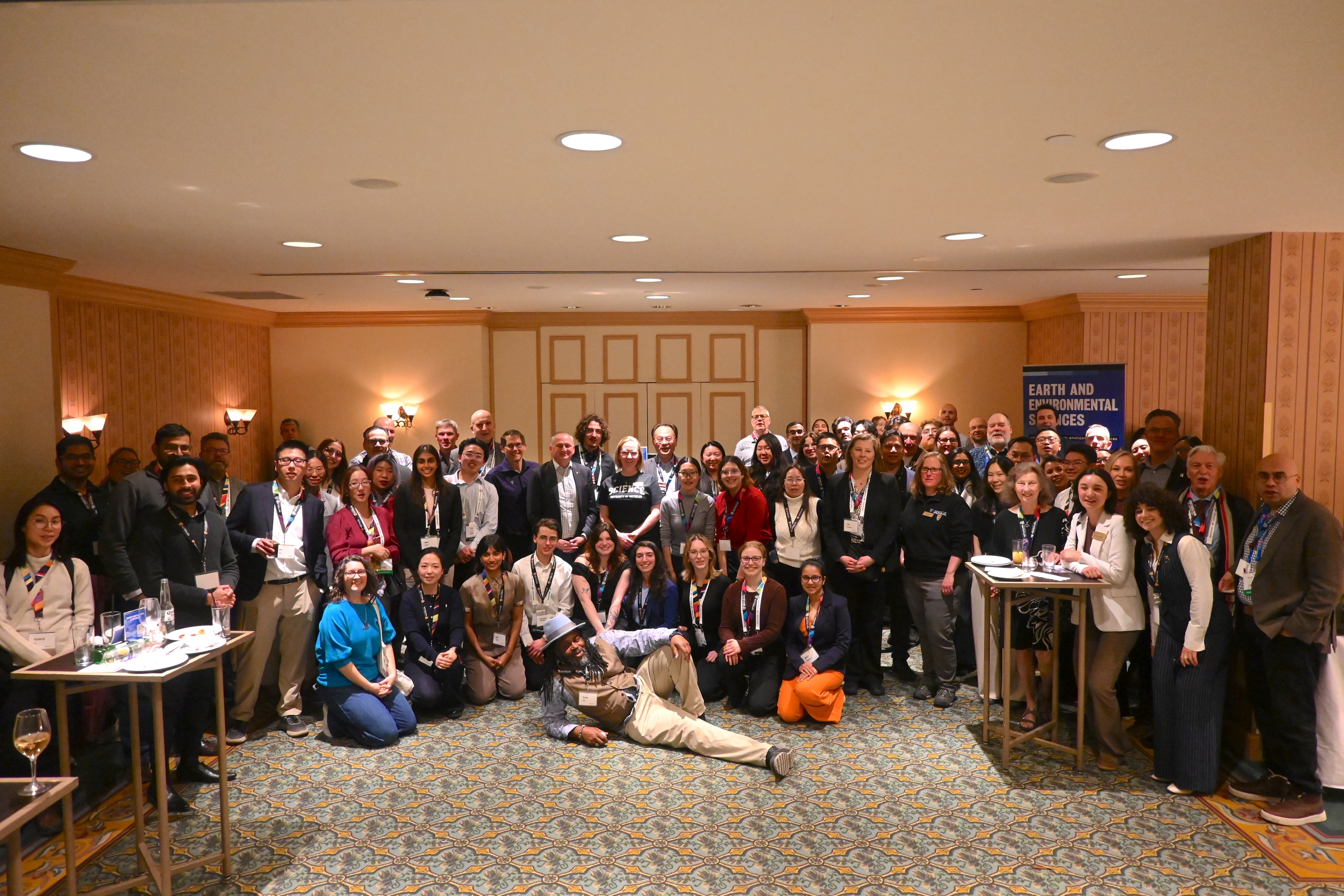 A group of alumni all gathered at the PDAC reception