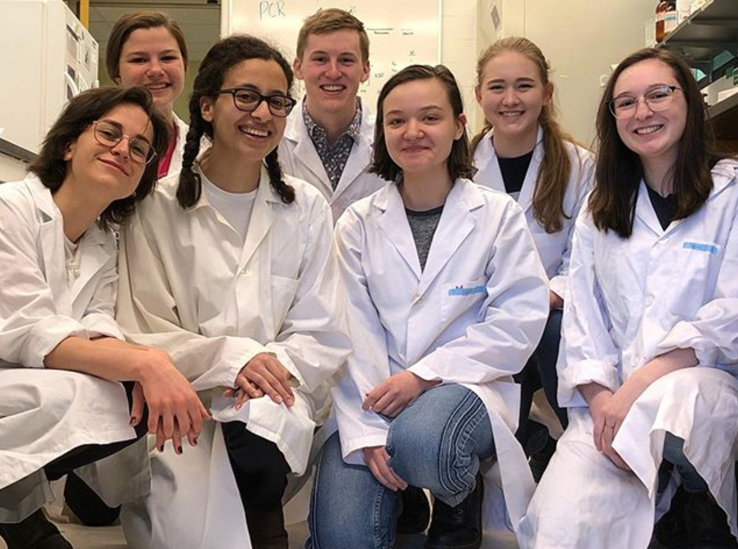 iGEM lab team in lab coats