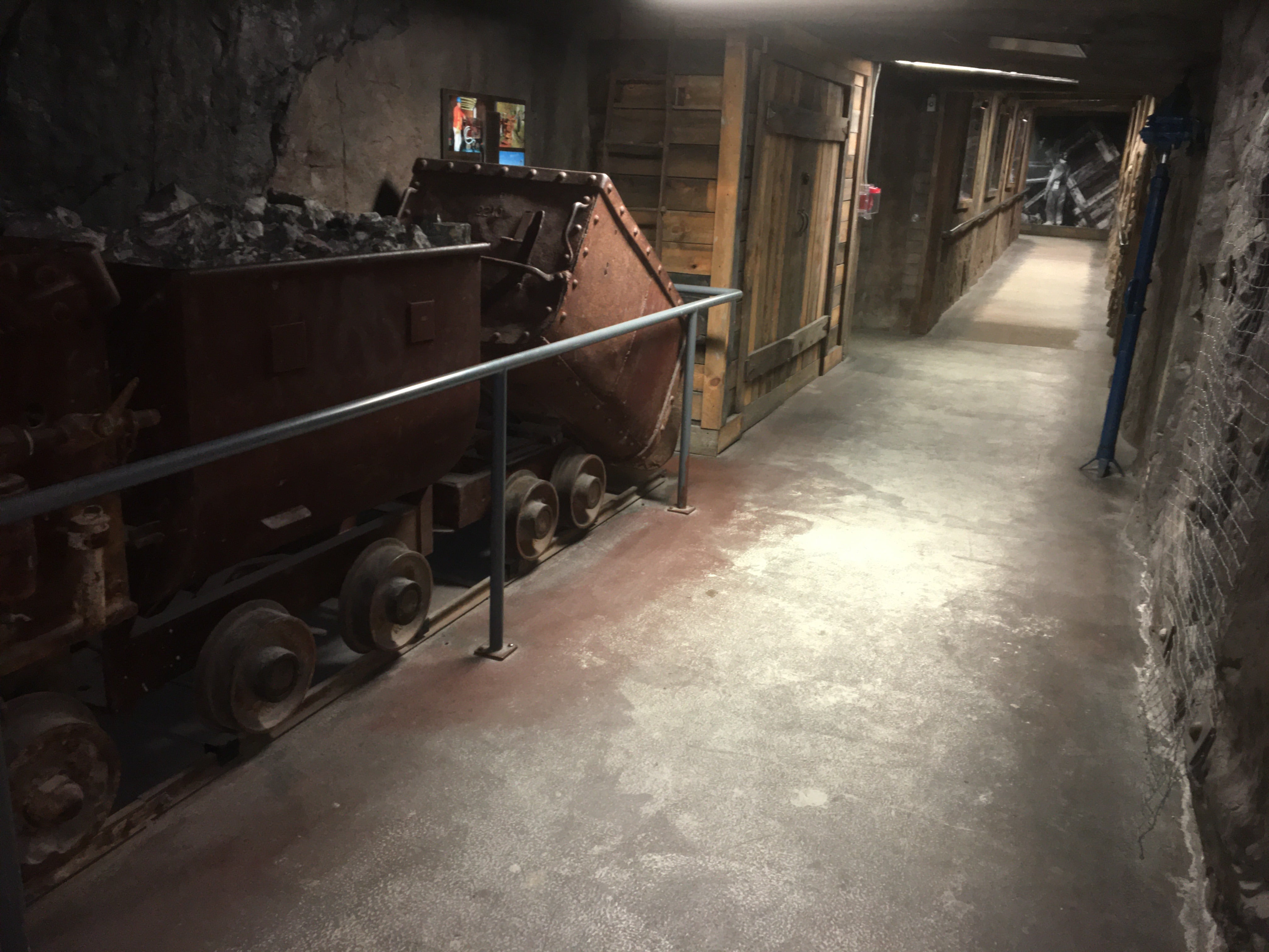 The mining tunnel in EIT, showing a mine cart and rock-covered walls