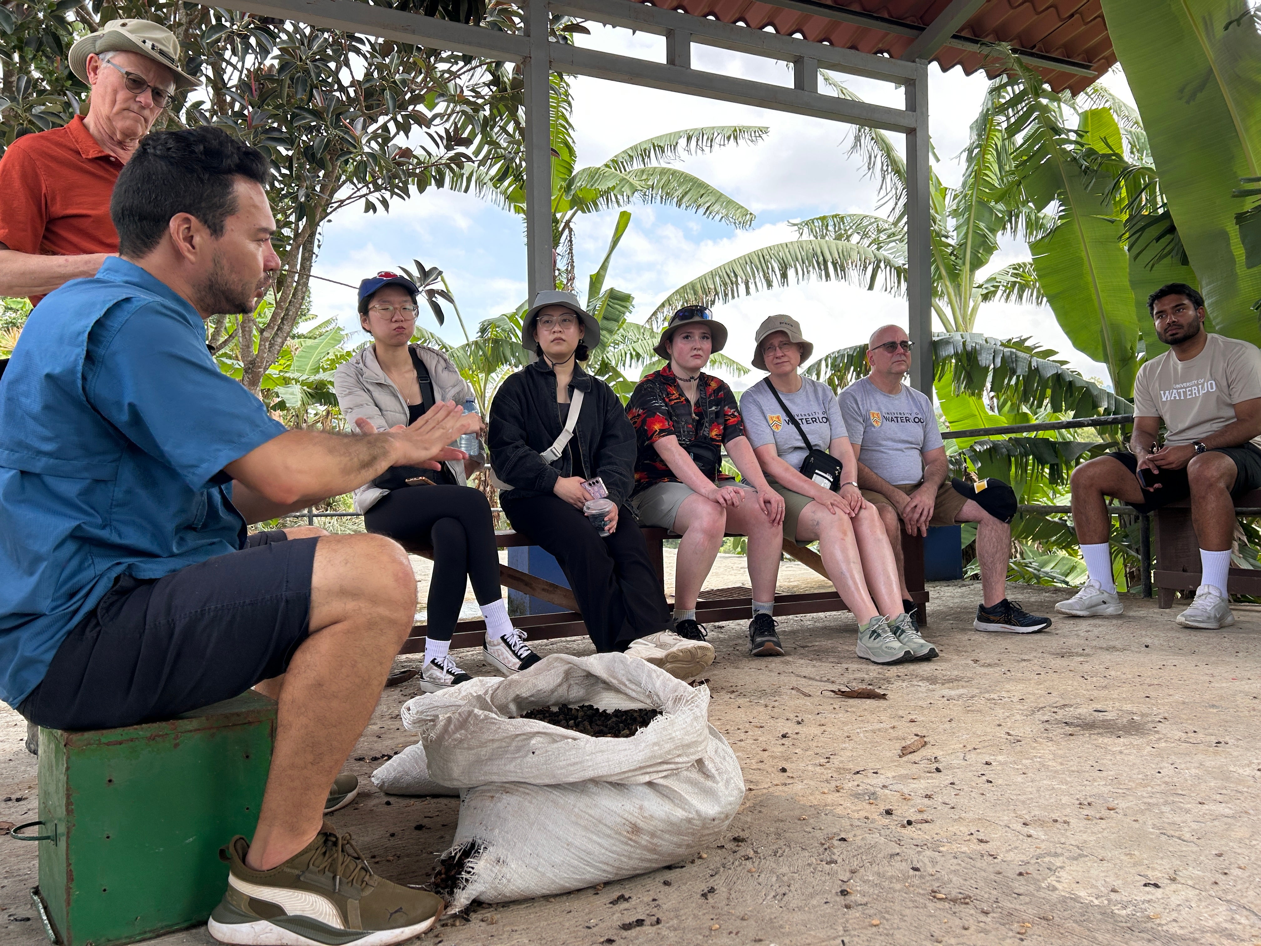 Alumni listening to an interpreter