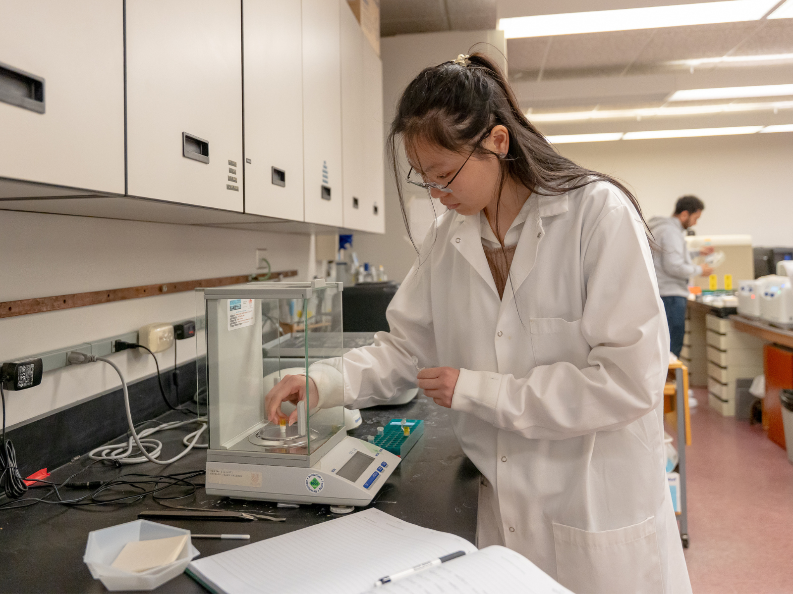 Ivy Vong working in a lab