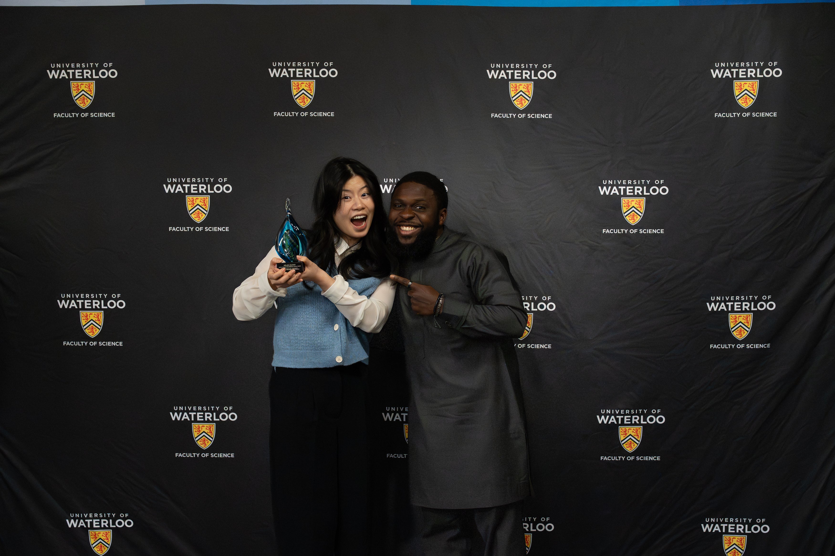 Helen Huang and her nominator posing with her award