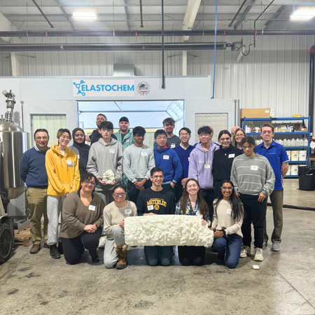 A group of students on a tour at Elastochem