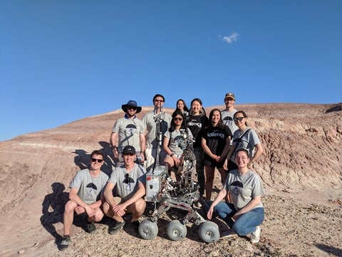 Team photo taken in the deserts of Utah