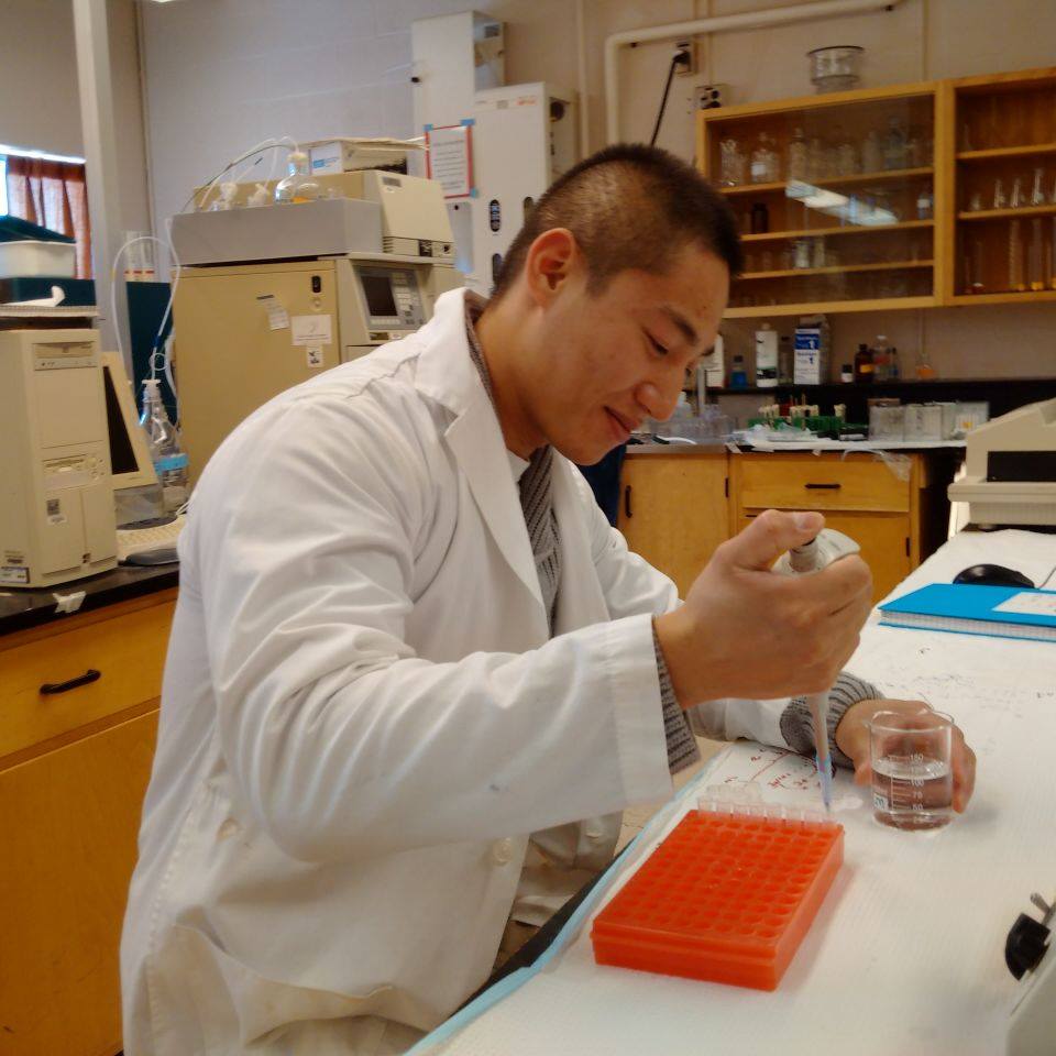 Lab Student Pipetting
