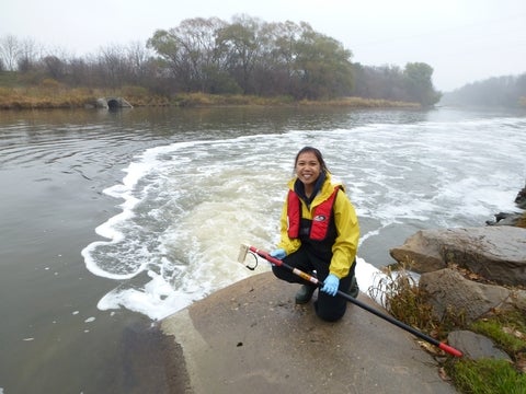 Maricor taking a water sample