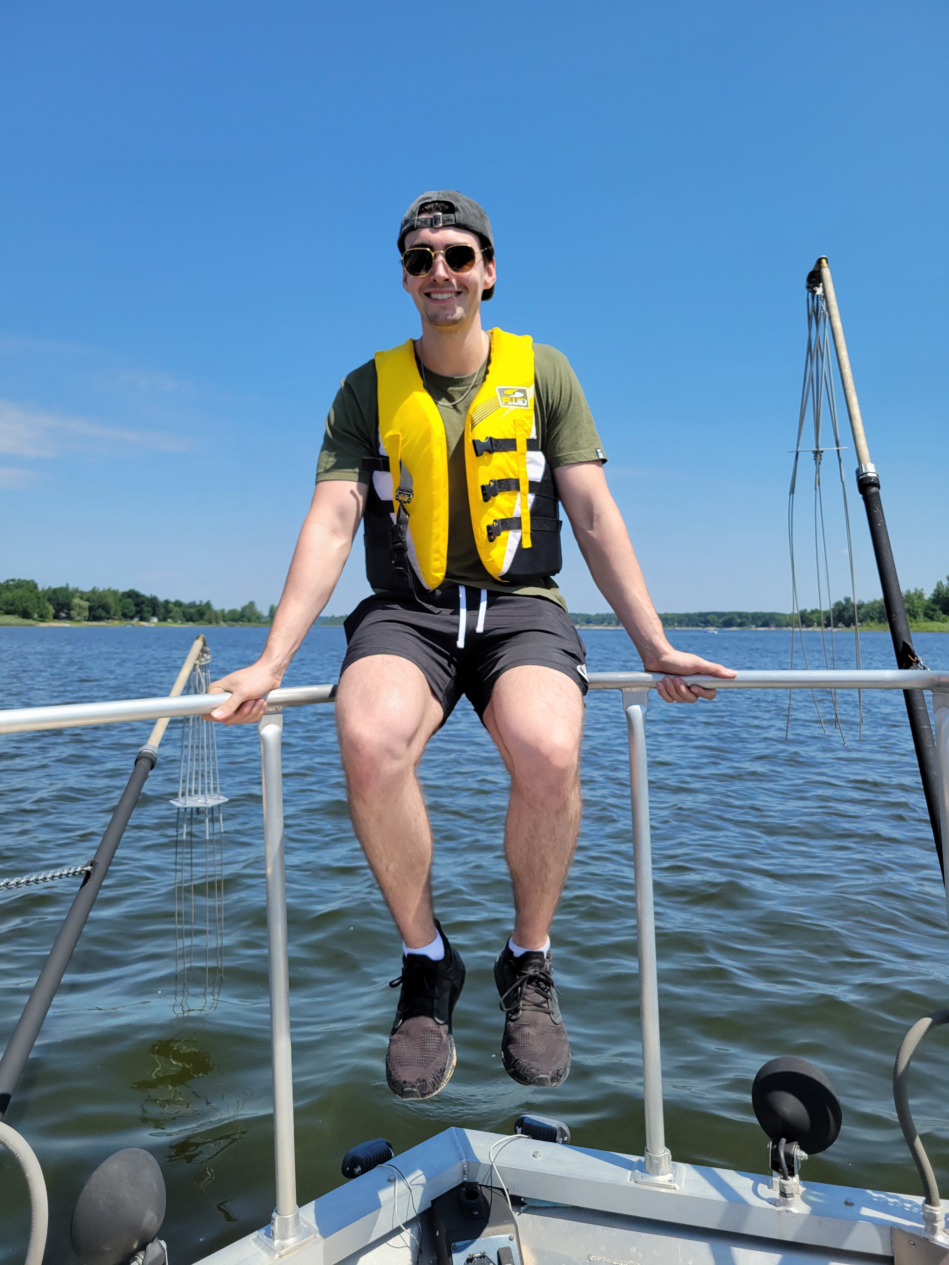Justin on a boat