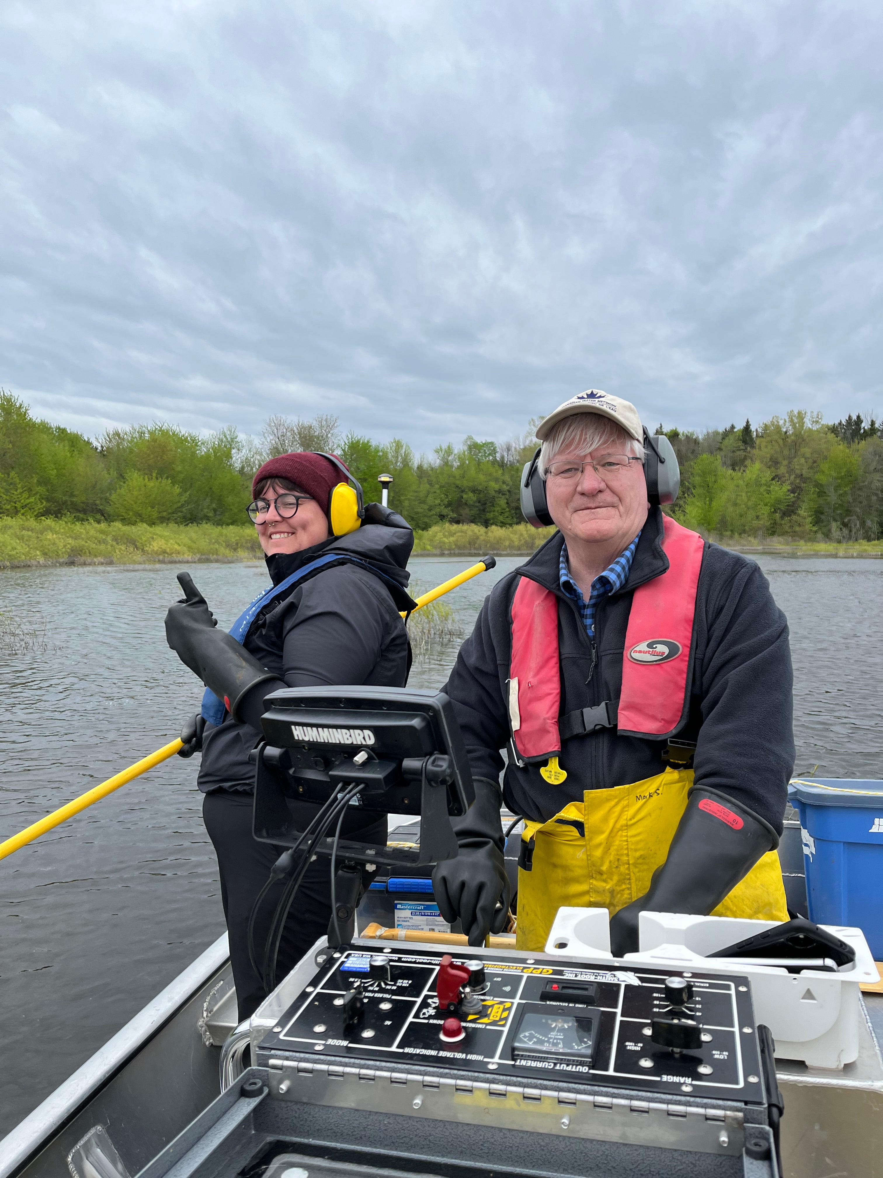 Mark and Erika boat electrofishing