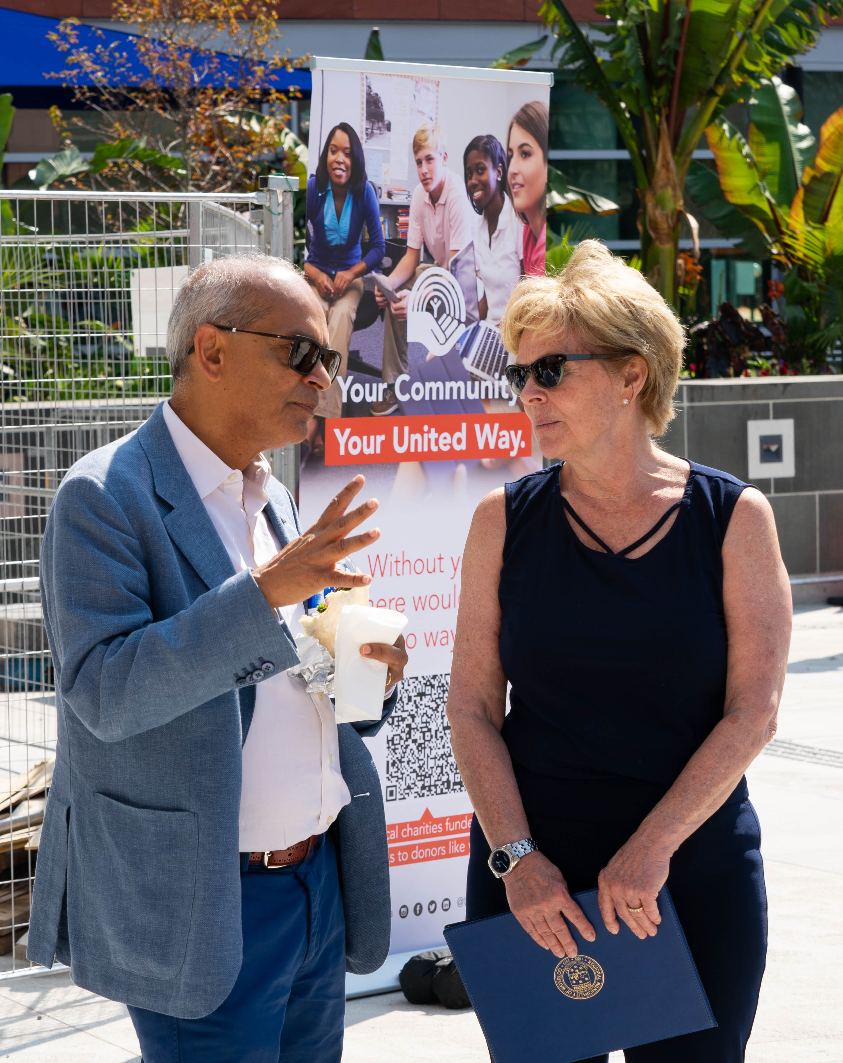 Vivek Goel talking to Karen Redman
