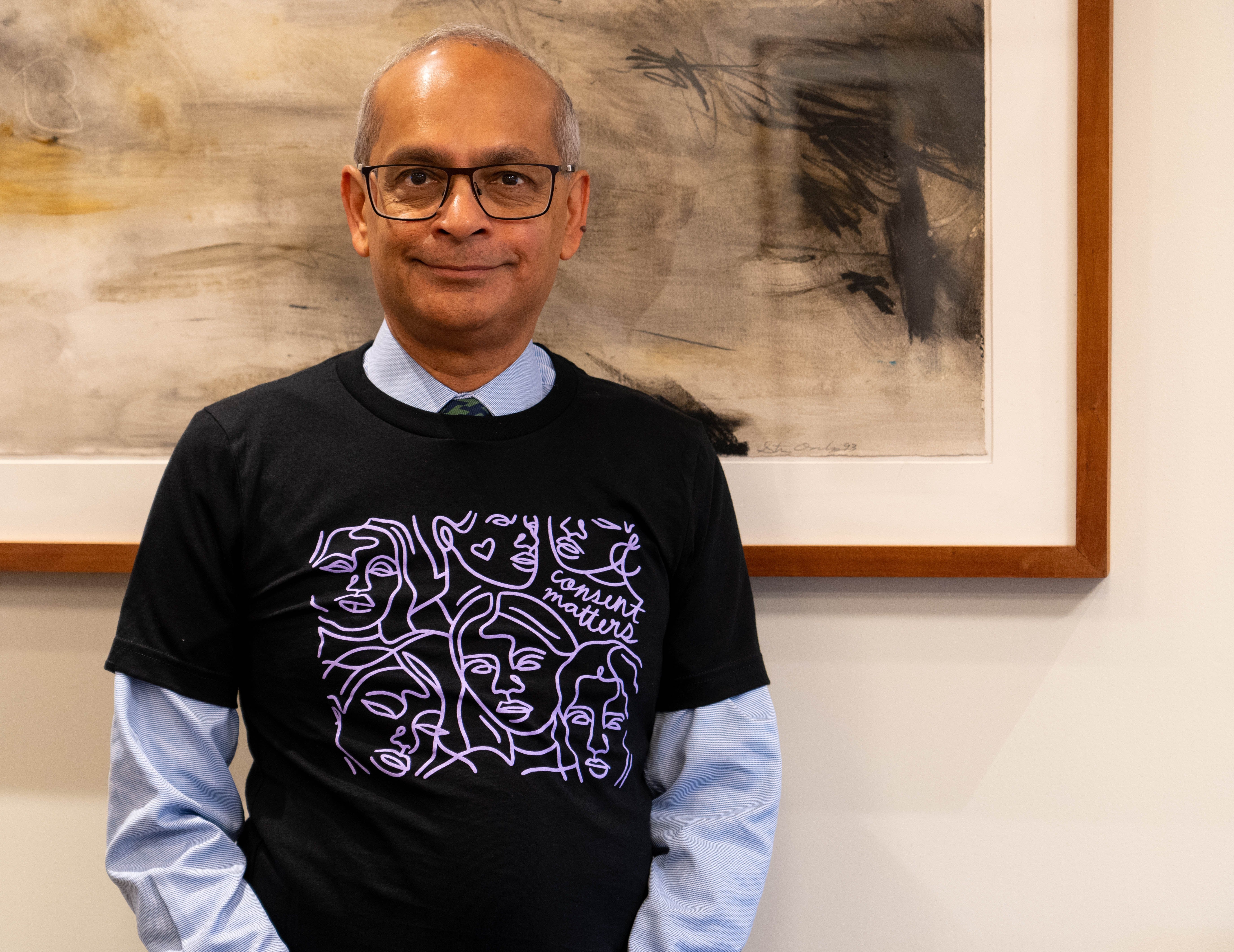 Vivek wearing a gender equity t-shirt