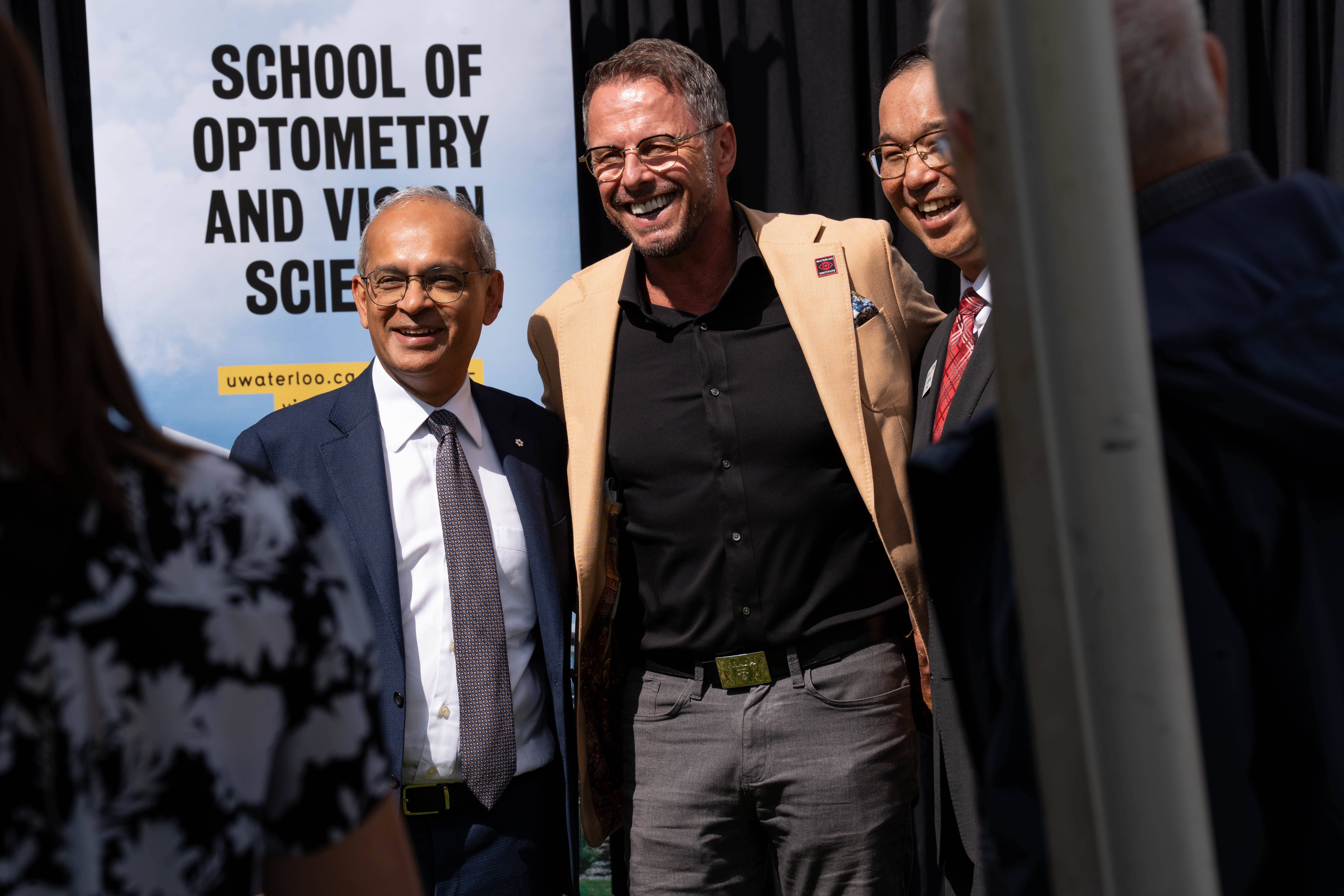 Vivek smiling with some high profile people