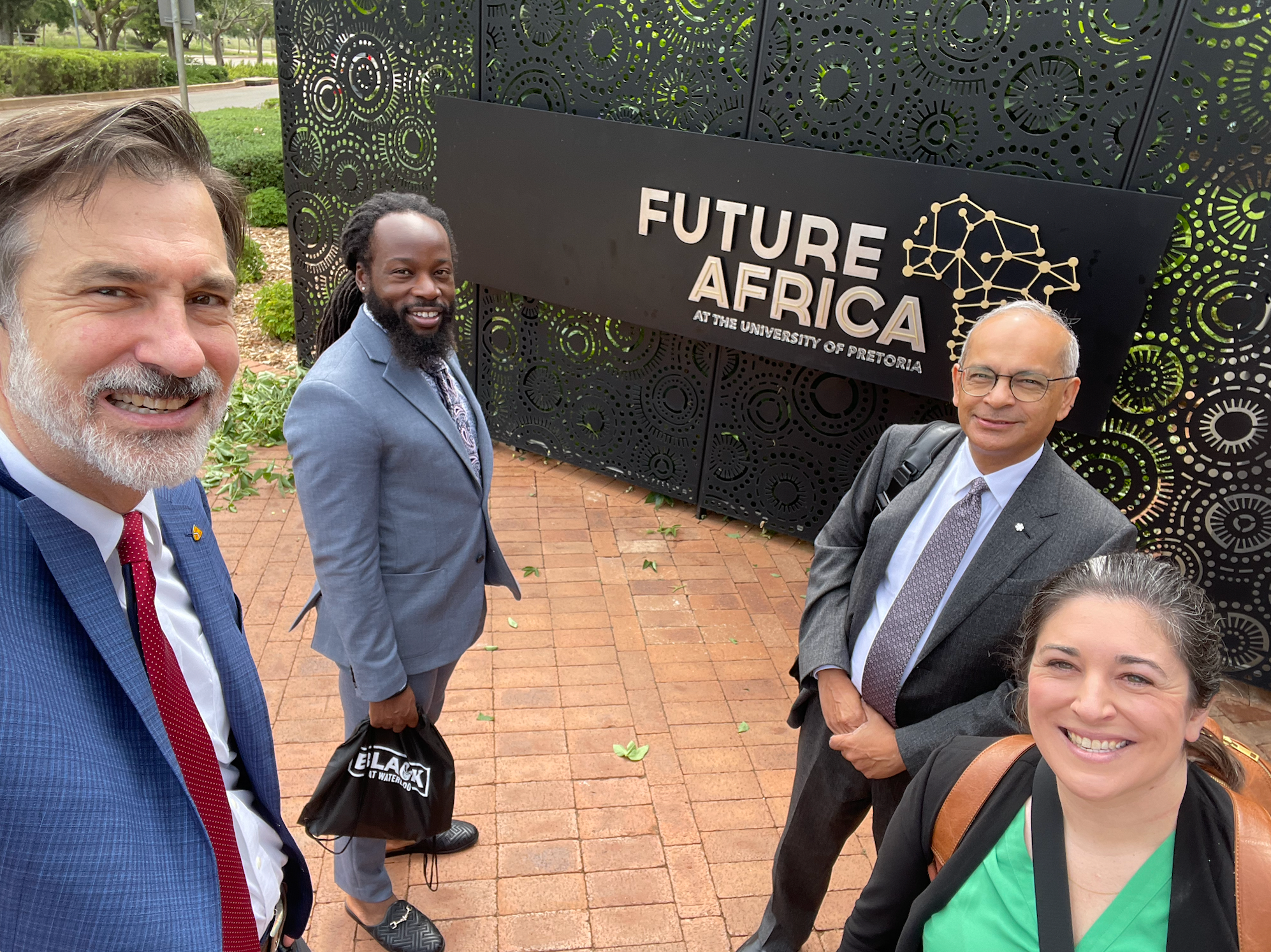 Vivek standing in front of a sign saying Future Africa