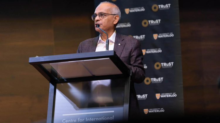 Vivek at the podium before the TRuST lecture